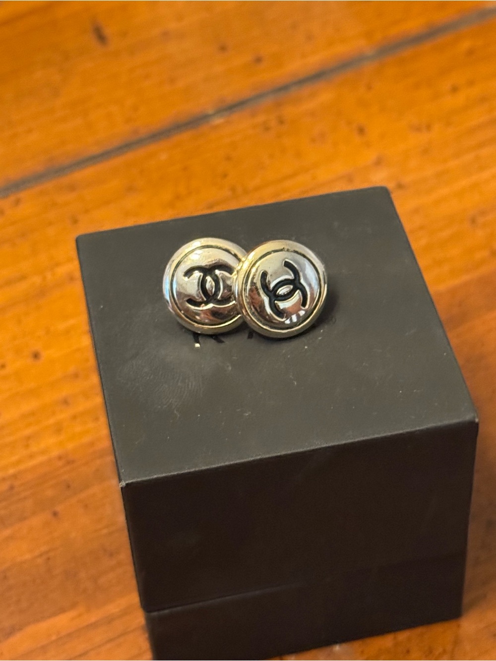 CHANEL Silver and Black Interlocking CC stud earrings
